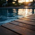 Swimming pool with sun light reflection and bokeh background. Royalty Free Stock Photo