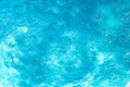 Swimming pool with sunny reflections background. Abstract water surface. Royalty Free Stock Photo