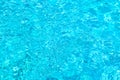Swimming pool with sunny reflections background. Abstract water surface. Royalty Free Stock Photo