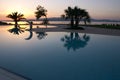 Swimming pool sunset Royalty Free Stock Photo