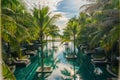 Swimming pool surround with coconut tree and bangalows at seaside resort Royalty Free Stock Photo