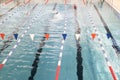 Swimming pool for swimming competitions. Empty Paths of a competitive swimming pool. Active swimming lessons.