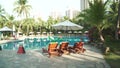 Swimming pool in a tropical garden on site Resort Intime Sanya 5 unfocused time lapse stock footage video