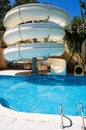 Swimming pool with water slide Royalty Free Stock Photo