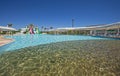 Swimming pool with water slides in a luxury tropical hotel resort Royalty Free Stock Photo