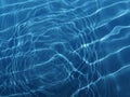 Swimming pool water surface with sparkling light reflections Royalty Free Stock Photo