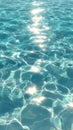 Swimming pool water surface with sunlight reflections and ripples. Royalty Free Stock Photo
