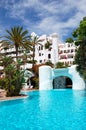 Swimming pool with waterfall Royalty Free Stock Photo