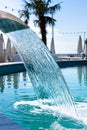 Swimming pool waterfall jet Royalty Free Stock Photo