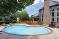 Swimming pool with wood deck Royalty Free Stock Photo