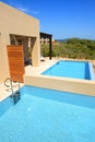 Swimming pools by luxury villas with sea view Royalty Free Stock Photo