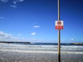 Swimming Prohibited sign on the beach. Royalty Free Stock Photo