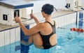 Swimming, sports and woman start in pool for exercise, training and workout for competition in gym. Fitness, diving and Royalty Free Stock Photo