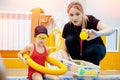 Swimming trainer woman instructing kid girl in pool, concept swimmer children