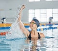 Swimming winner, success or happy woman in celebration for achievement in race or pool competition. Fitness, smile or Royalty Free Stock Photo