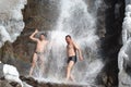 Swimming in winter waterfall