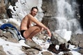 Swimming in winter waterfall Royalty Free Stock Photo