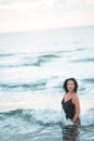 Swimming woman in sea water