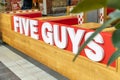 Swindon, UK - October 27, 2023: FIVE GUYS, famous franchise of fast food restaurants, burgers, fries, milkshakes in