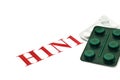 Swine FLU H1N1 - Closeup of green and white pills Royalty Free Stock Photo