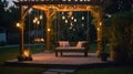 Romantic Garden Swing at Night Under Pergola with Fairy Lights Royalty Free Stock Photo