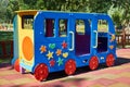 Swing car for children in the public playground Royalty Free Stock Photo