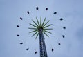 Swing carousel on the cloudy day