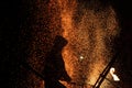 Fire show at night. men stands in front of an audience and breathe fire Royalty Free Stock Photo