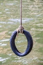 Swing that made from tire tied with rope Royalty Free Stock Photo