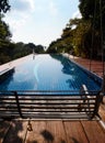 Tropical resort pool view swing Royalty Free Stock Photo