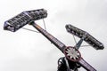 Swing ride going around at a fair. entertainment amusement park Royalty Free Stock Photo