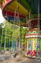 Swing rides in a children's park.