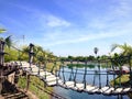 Swing Rope Bridge crossing nice and clear water lake Royalty Free Stock Photo