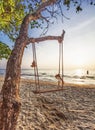 Swing on sunset at the beach Royalty Free Stock Photo