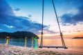 Swing on sunset at the beach Royalty Free Stock Photo