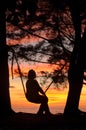 At the swing during sunset Royalty Free Stock Photo