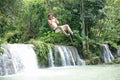 Swinging out terrified at the Cambugahay Falls on Siquijor Island, the Philippines