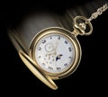 Swinging pocket watch Royalty Free Stock Photo