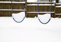 Swings Covered with Snow Royalty Free Stock Photo