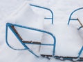 Swings covered with snow