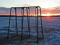 Swings on empty beach