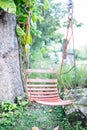 Swings in the garden relaxing Royalty Free Stock Photo