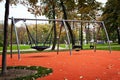 Swings on kids playground Royalty Free Stock Photo