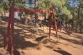 Swings in a recreational area for the children Royalty Free Stock Photo