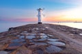 Swinoujscie. The famous stone lighthouse in the form of a windmill at dawn. Royalty Free Stock Photo