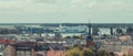 Swinoujscie, West Pomeranian - Poland - July 10, 2022: View from tower on sea, passengers ferry in port and residential areas in