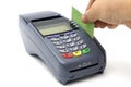 Swiping credit card with POS-terminal Royalty Free Stock Photo