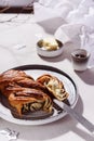 Swirl brioche with poppy seeds served with butter and jam Royalty Free Stock Photo
