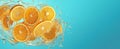 Swirl of freshly cut juicy orange slices, light blue background, copy space. Royalty Free Stock Photo