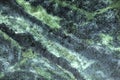 A swirled, green marble texture for graphic design purposes